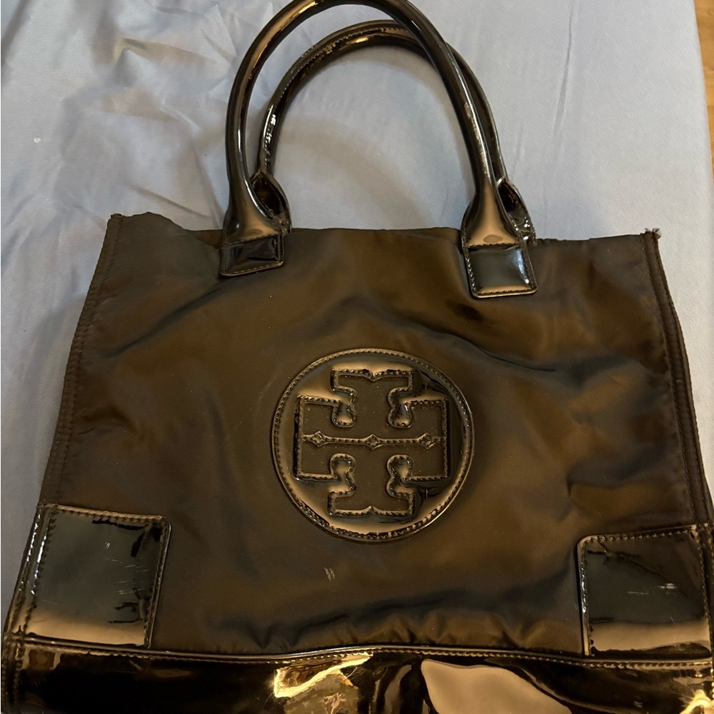 Black cloth and Pantent leather good condition a few skid marks.